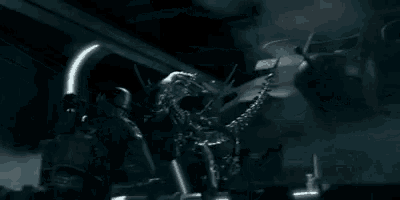 a person is holding a metal object in a dark room in a video game .