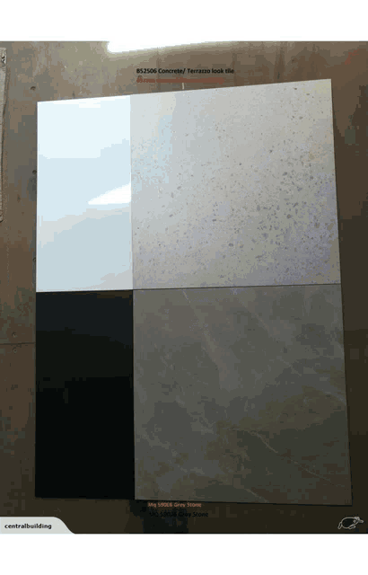 a display of various tiles including a black white and grey tile