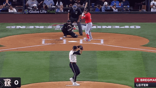 a baseball game is being played in front of a globe life field ad
