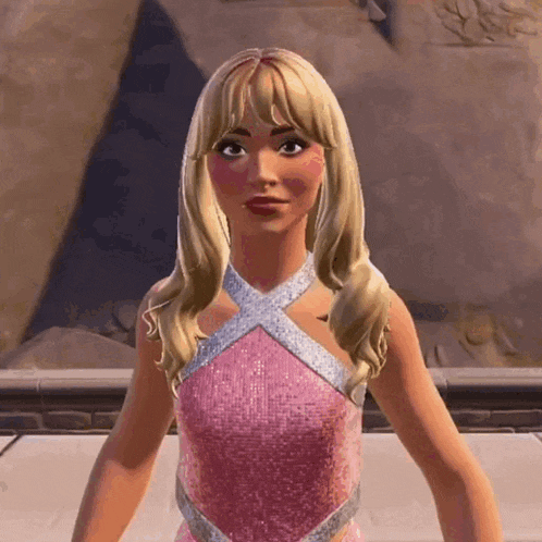 a woman in a pink and silver dress is standing in front of a statue .
