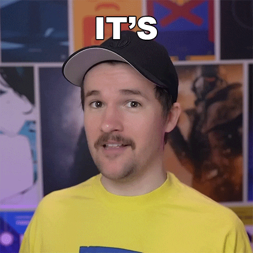 a man wearing a hat and a yellow shirt with the words it 's on his face