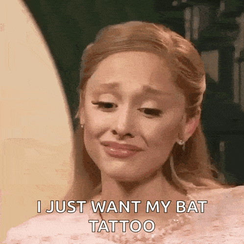 a woman in a pink dress is crying and says i just want my bat tattoo
