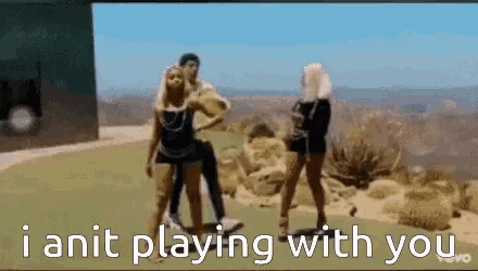 a man and two women are standing next to each other with the words i anit playing with you above them .