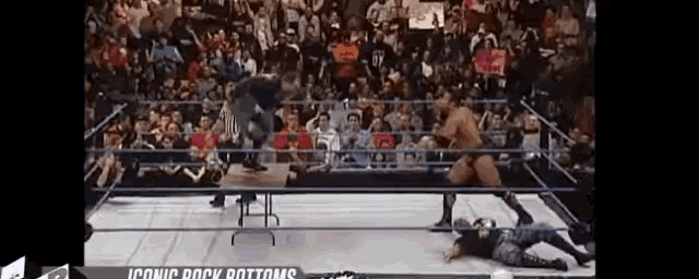 a wrestling ring with the words iconic rock bottoms at the top