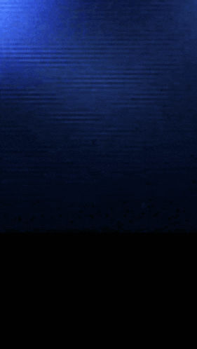 a woman 's face is shown with a blue background