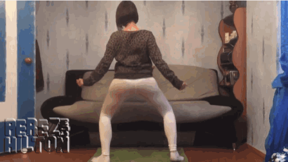 a woman dancing in front of a couch with the name teresa hilton