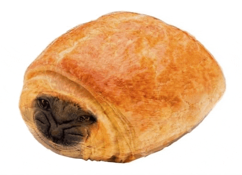 a loaf of bread with a cat face on it