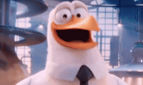a cartoon duck wearing a suit and tie is standing in a room .