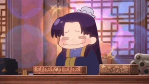 a cartoon character is sitting at a desk in front of a window .