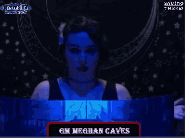 a woman in a black dress is standing in front of a sign that says am meghan caves