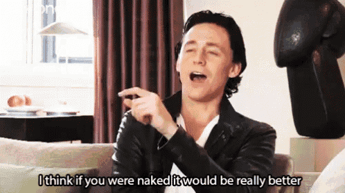a man in a leather jacket is sitting on a couch and says i think if you were naked