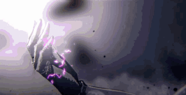 a close up of a person 's hand holding a sword with purple lightning coming out of it .