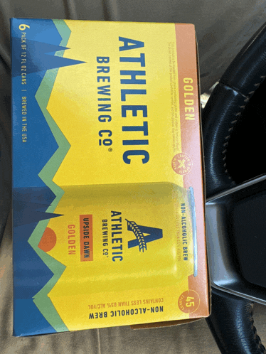 a box of athletic brewing co 's golden ale