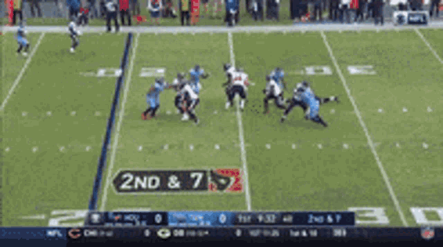 a football game is going on and the score is 2nd and 7