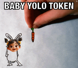 a baby yolo token is being held up by a person