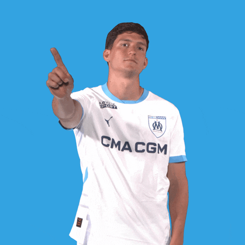 a man in a white shirt with cma cgm on it