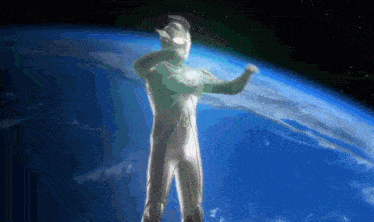 a man in a white suit stands in front of a blue planet