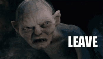 a close up of a gollum from the lord of the rings screaming with the word leave behind him .
