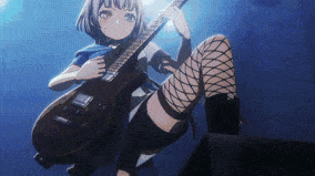 a girl is playing a guitar in a dark room