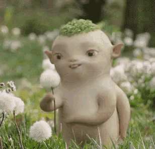 a cartoon character with a green head is holding a dandelion
