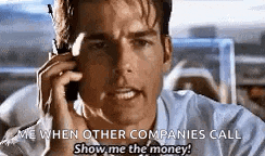 a man is talking on a cell phone and says `` me when other companies call show me the money '' .