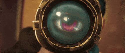 a woman with blue hair and red eyes is looking at something