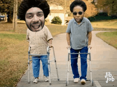 two men are walking with walkers with jib job written on the bottom right
