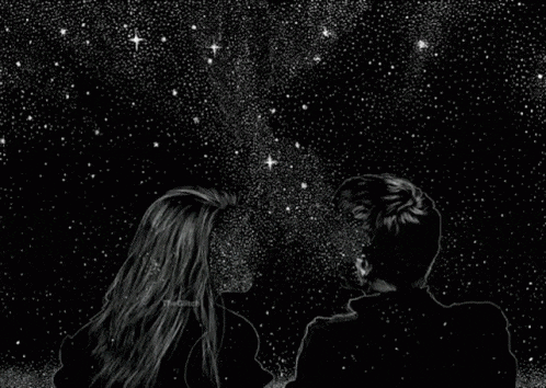 a man and a woman are looking at the stars in the night sky