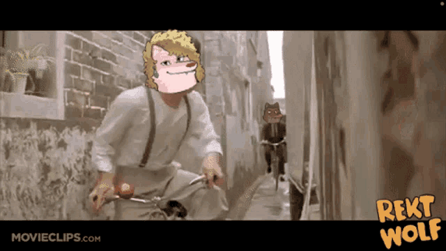 a man is riding a bike down a narrow street with a cartoon of a wolf on his head