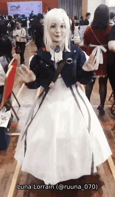 a woman in a costume with the name luna lorraine at the top