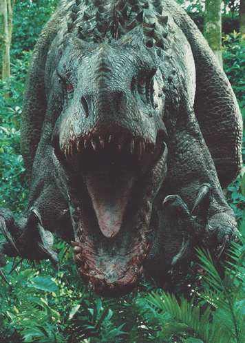 a large dinosaur with its mouth open surrounded by trees