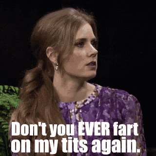 a woman in a purple dress is talking to someone and says `` don 't you ever fart on my tits again . ''