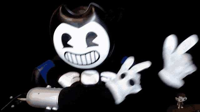 a black and white cartoon character with a smiley face