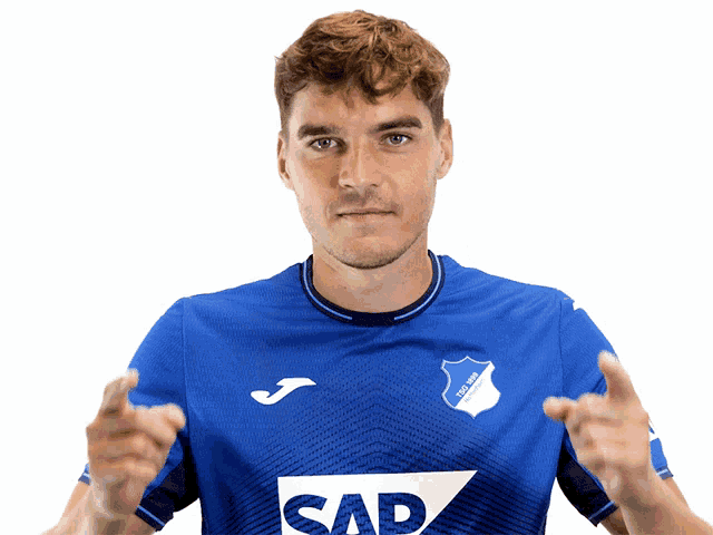 a man wearing a blue shirt with sap on it