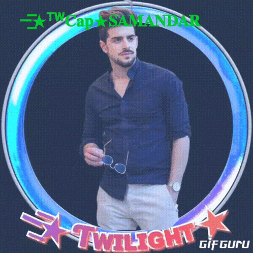 a man in a blue shirt stands in a twilight frame