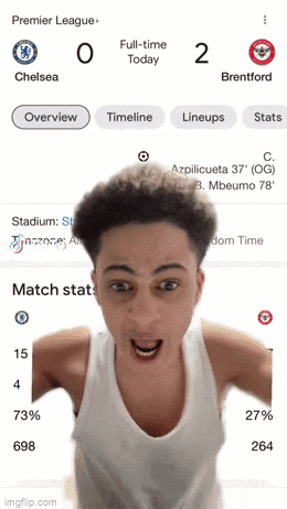 a screenshot of a soccer game between chelsea and brentford with a man making a funny face