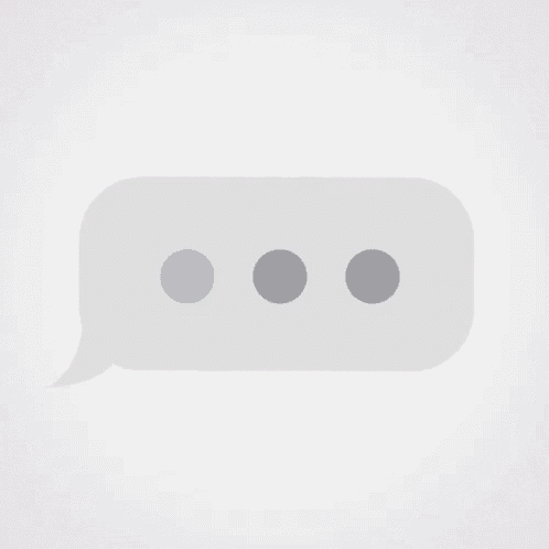 a white speech bubble with three dots on it