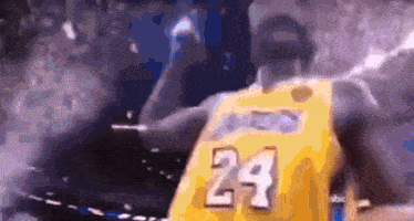 basketball player wearing a yellow jersey with the number 24 on it