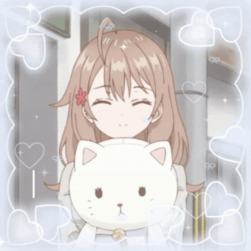 a girl with a flower in her hair is holding a cat
