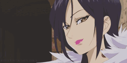 a close up of a cartoon character with purple hair and yellow eyes .