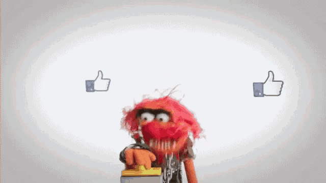 a cartoon character with red hair is holding a hammer and giving a thumbs up sign