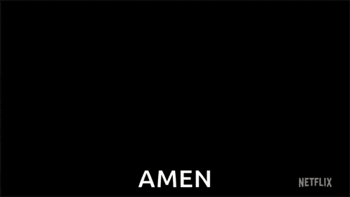 a man holding a lit match next to another man with the word amen on the bottom right