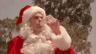 Drinking Santa Claus GIF - Drinking Santa Claus GIFs