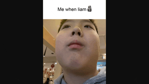 a boy 's face is shown with the caption " me when liam "