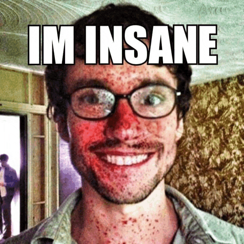 a man with blood on his face and the words im insane on the top