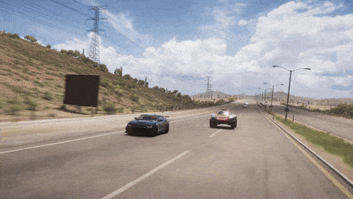 two cars are driving down a highway with power lines