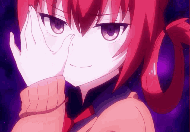 a girl with red hair is covering her eyes with her hand