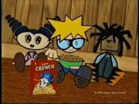 a box of aero crunch cereal sits on a wooden table