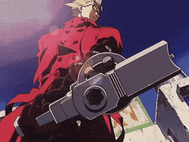 a man in a red coat holds a large gun