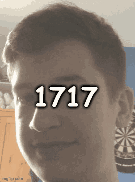 a close up of a person 's face with the number 1717 written on it